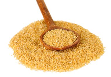 arnautka in wooden spoon on white background close-up