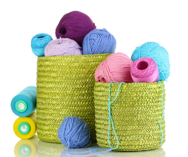 Colorful yarn for knitting in green basket isolated on white — Stock Photo, Image