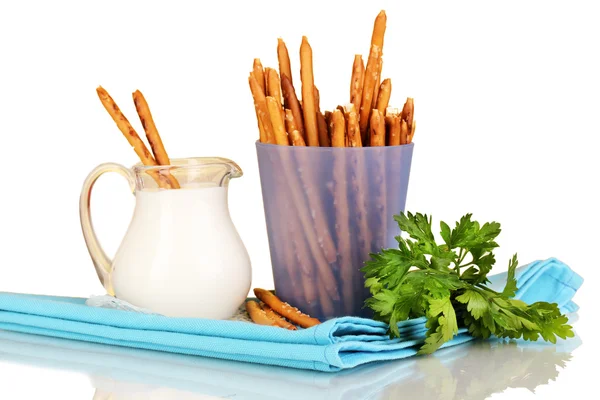 Tasty crispy sticks in purple plastic cup on yellow background — Stock Photo, Image