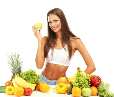 Meyve ve sebzeli güzel bir kadın, beyaz tenli.