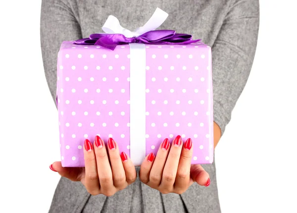 Woman holds box with gift on white background close-up — 图库照片