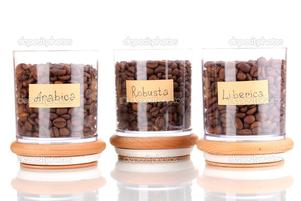 Coffee beans in jars isolated on white