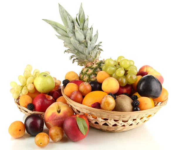 Still life of fruit in basket isolated on white — Stock Photo, Image