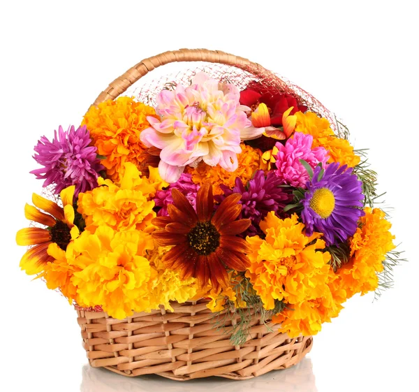 Beautiful bouquet of bright flowers in basket isolated on white — Stock Photo, Image