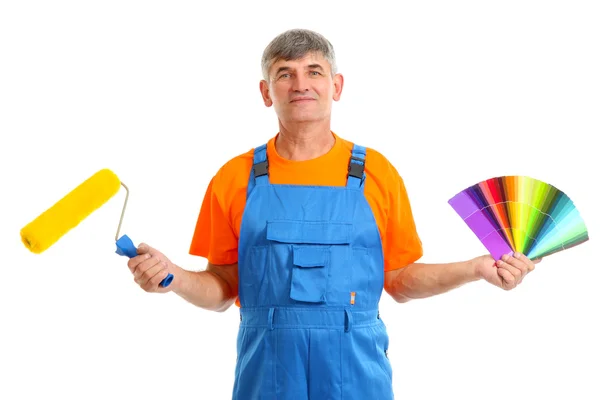 Pintor de casa con rodillo de pintura y paleta de colores aislado en blanco —  Fotos de Stock