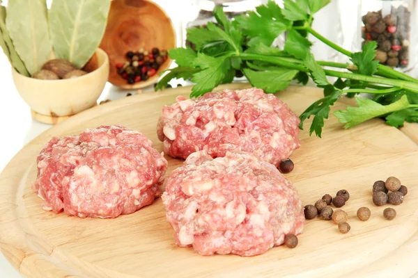 Raw meatballs with spices — Stock Photo, Image