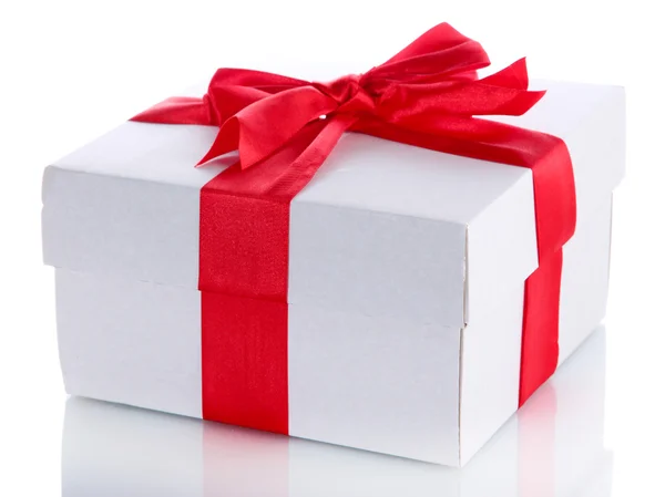 Gift box with red ribbon, isolated on white Royalty Free Stock Images
