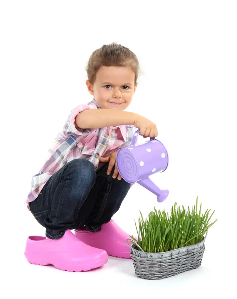 Beautiful little girl with watering can isolated on white — Stock Photo, Image