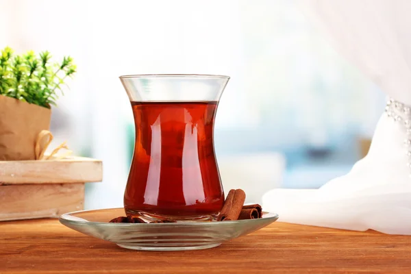 Glass of Turkish tea, on wooden table — Stock Photo, Image