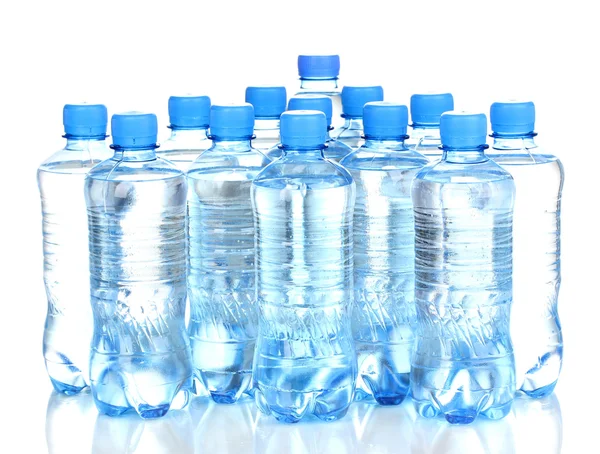 Plastic bottles of water isolated on white — Stok fotoğraf