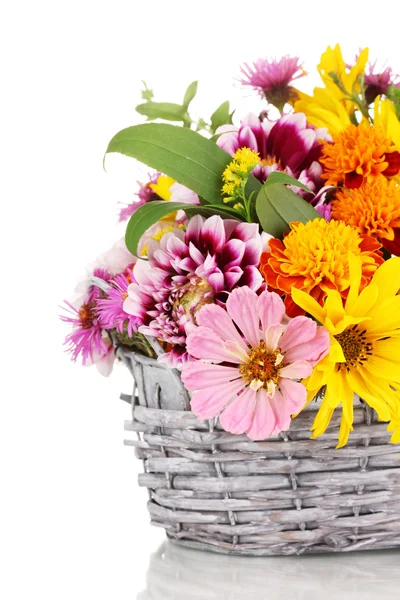 Beautiful bouquet of bright flowers in basket isolated on white — Stock Photo, Image
