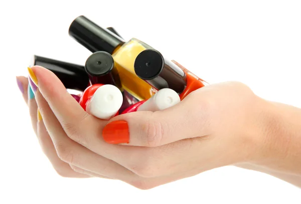 Vrouw handen met nagel poetsmiddelen geïsoleerd op wit — Stockfoto