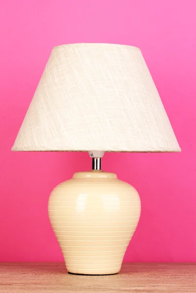 Table lamp on pink background — Stock Photo, Image