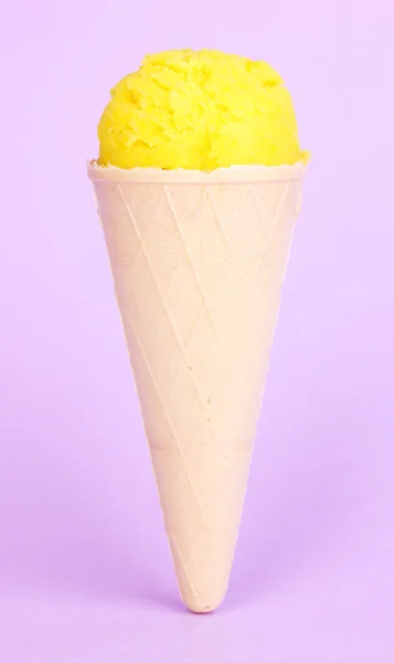 Banana ice cream with cone on lilac background — Stock Photo, Image