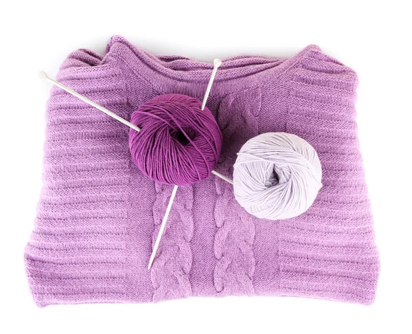 Purple sweater and a ball of wool isolated on white — Stock Photo, Image