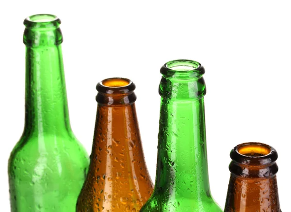 Kleurrijke lege glazen flessen geïsoleerd op wit — Stockfoto