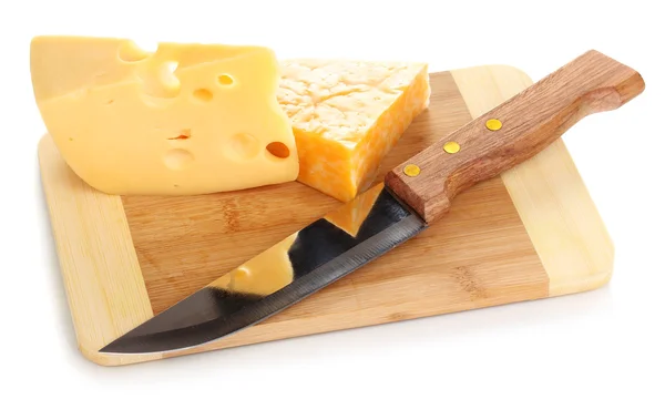 Cheese on cutting board with knife isolated on white Royalty Free Stock Images