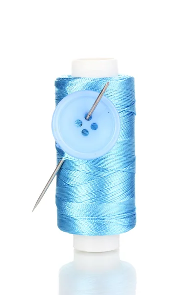 Blå spolen med nål och knappar isolerad på vit — Stockfoto