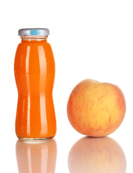 Delicious peach juice in glass bottle and peach next to it isolated on white — Stock Photo, Image
