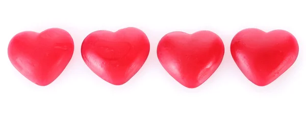 Corazones de caramelo rojo aislados en blanco — Foto de Stock