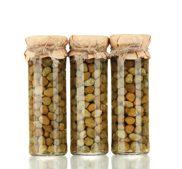 Glass jar with tinned capers isolated on white — Stock Photo, Image