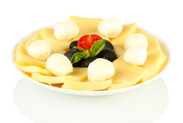 Sliced mozzarella cheese with vegetables in the plate isolated on white — Stock Photo, Image