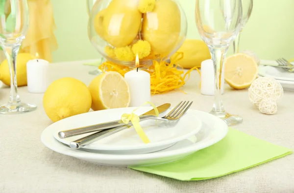 Beautiful holiday table setting with lemons, close up — Stock Photo, Image