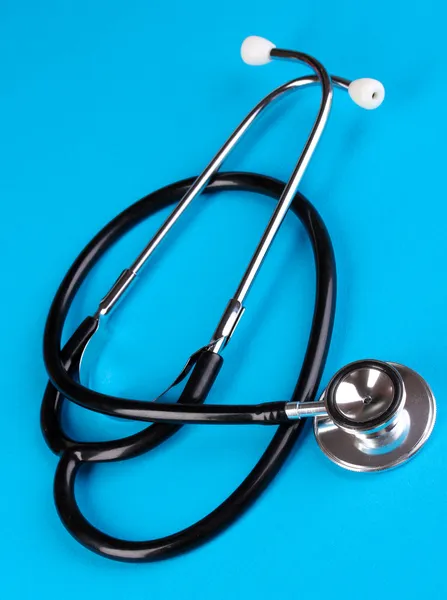 Stethoscope on blue background — Stock Photo, Image
