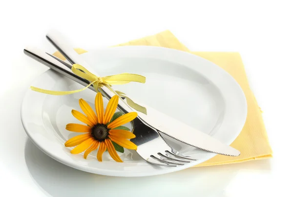 Spoon, fork and flower on plate, isolated on white — Stock Photo, Image