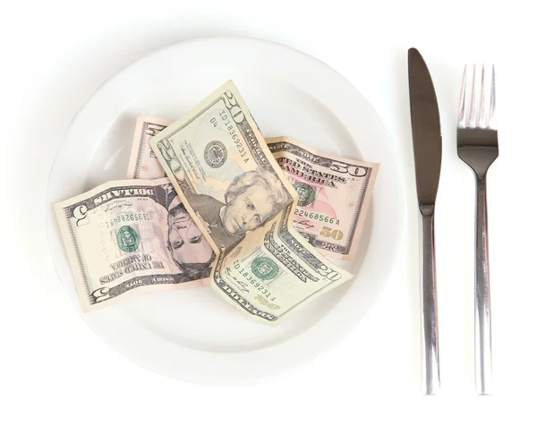 Geld auf Teller isoliert auf weißem Hintergrund Nahaufnahme — Stockfoto