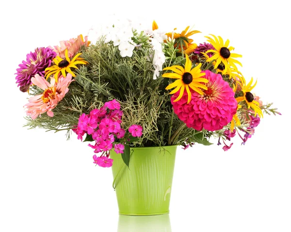 Beautiful bouquet of bright flowers in pail isolated on white — Stock Photo, Image