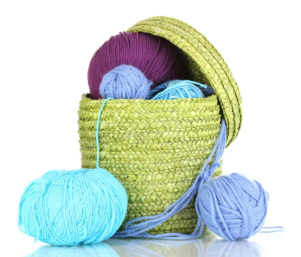 Colorful yarn for knitting in green basket isolated on white — Stock Photo, Image