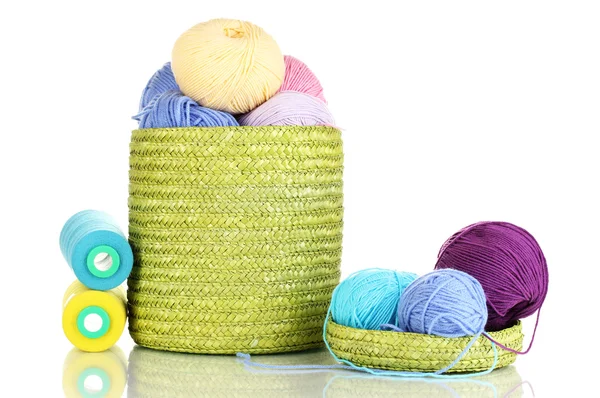 Colorful yarn for knitting in green basket isolated on white — Stock Photo, Image