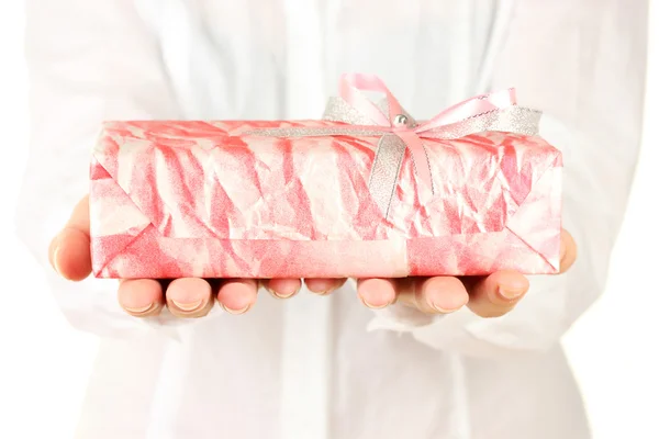 Woman holds a box with a gift on white background close-up — Stock Photo, Image