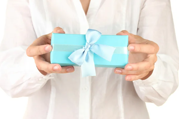 Woman holds a box with a gift on white background close-up — Stock Photo, Image