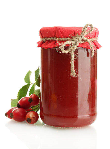 jar with hip roses jam and ripe berries, isolated on white