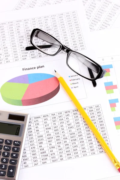 Documentos, calculadora e óculos close-up — Fotografia de Stock