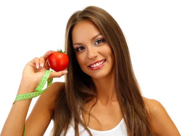 Hermosa joven con tomate y cinta métrica, aislada en blanco — Foto de Stock