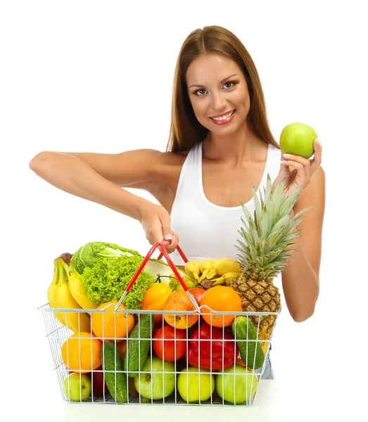 Bella giovane donna con frutta e verdura nel carrello della spesa, isolata su bianco — Foto Stock