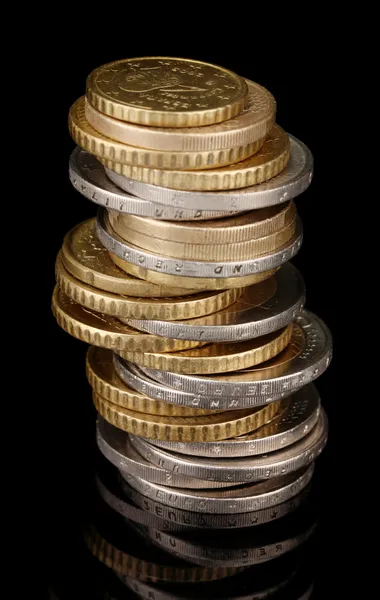 Euro coins isolated on black — Stock Photo, Image