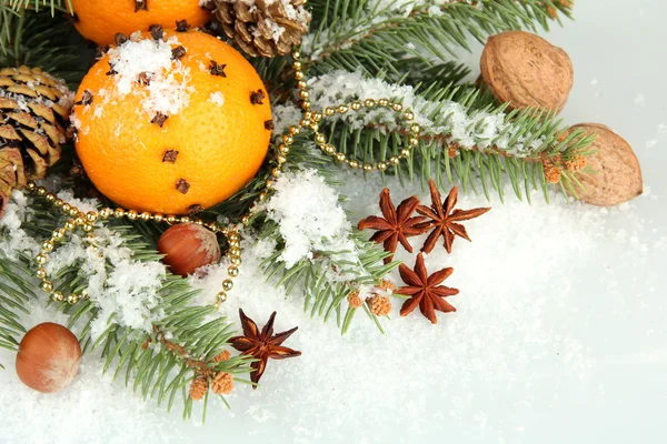 Christmas composition with oranges and fir tree, isolated on white — Stock Photo, Image