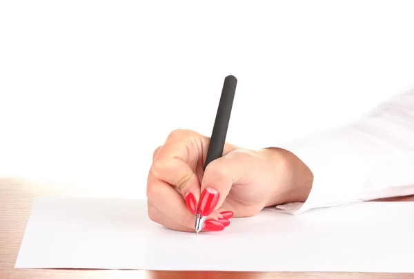 Hands writing on paper on white background Stock Photo