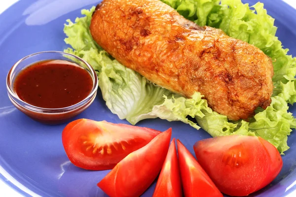 Tasty meat cutlet with garnish on plate close-up — Stock Photo, Image