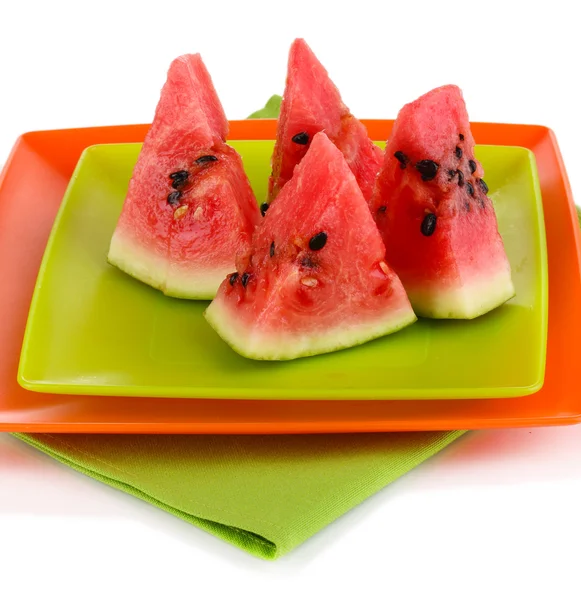 Söt vattenmelon skivor på tallrikar isolerad på vit — Stockfoto
