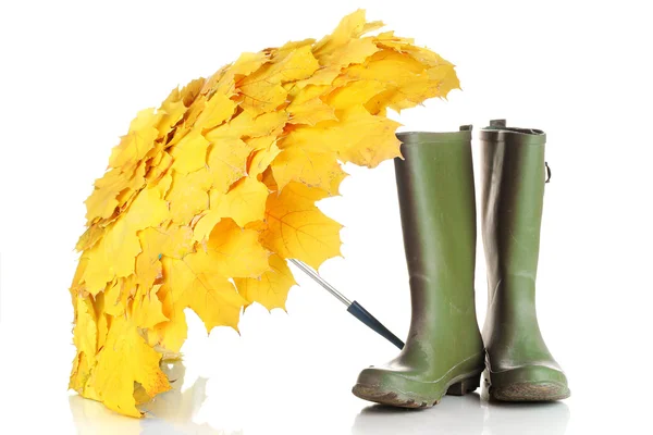 Maple leaves umbrella with green gumboots isolated on white — Stock Photo, Image
