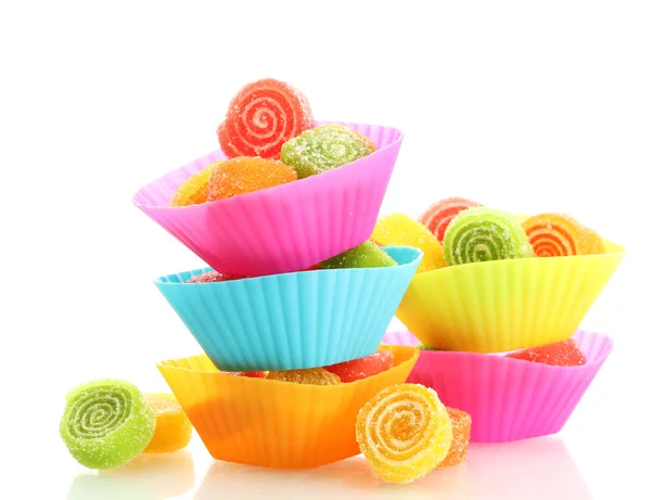 Sweet jelly candies in cup cake cases isolated on white — Stock Photo, Image