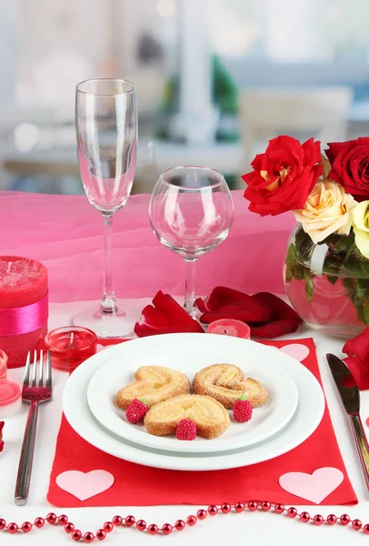 Table setting in honor of Valentine's Day on room background — Stock Photo, Image