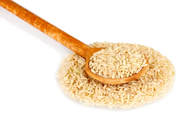 Rice in wooden spoon isolated on white background — Stock Photo, Image