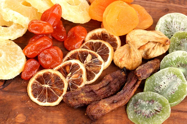 Dried fruits on wooden background — Stock Photo, Image