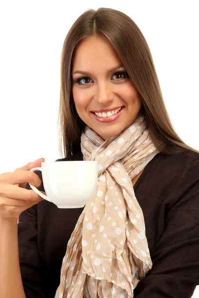 Mooie jonge vrouw met kop koffie, geïsoleerd op wit — Stockfoto